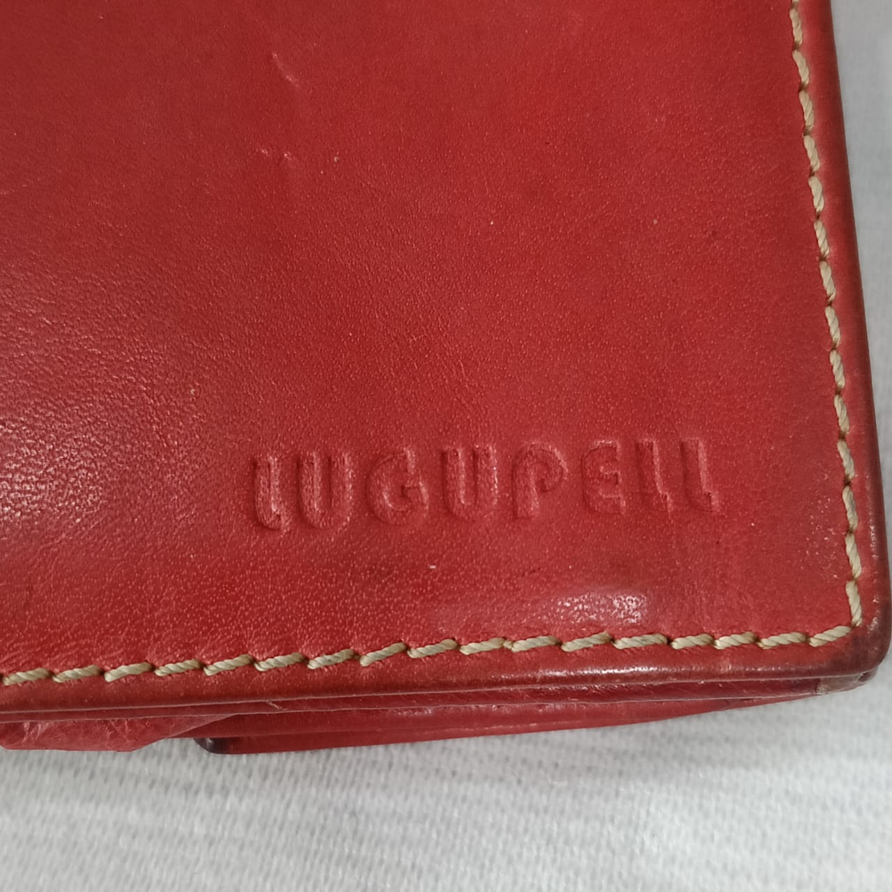 Portefeuille lugupell en cuir rouge vintage original