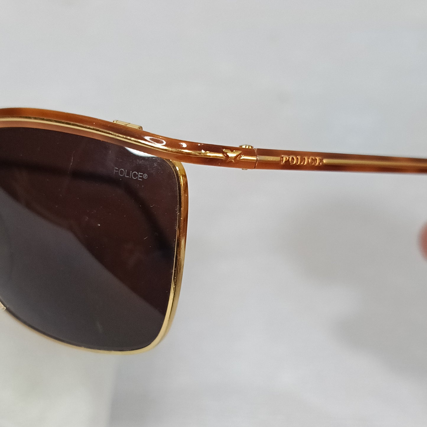Lunette police original en plaqué or vintage