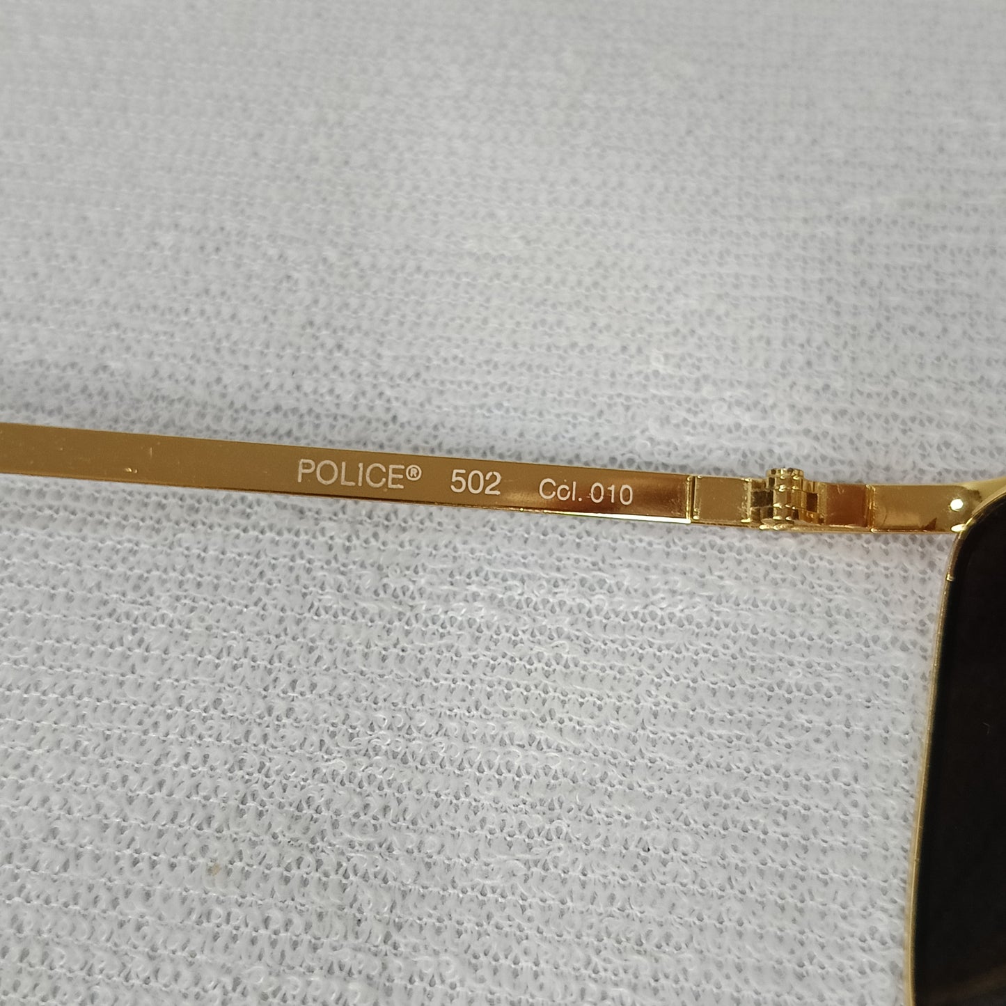 Lunette police original en plaqué or vintage