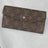 Portefeuille louis Vuitton Femme en cuir vintage