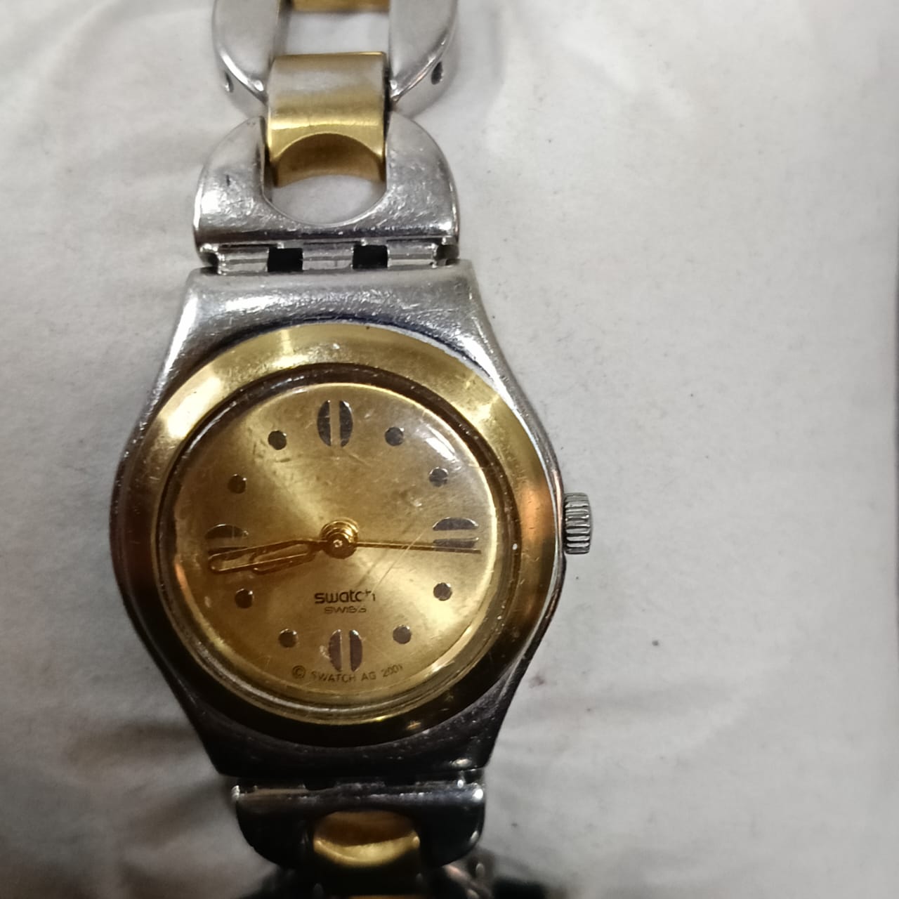 Montre swatch acier inoxydable femme original