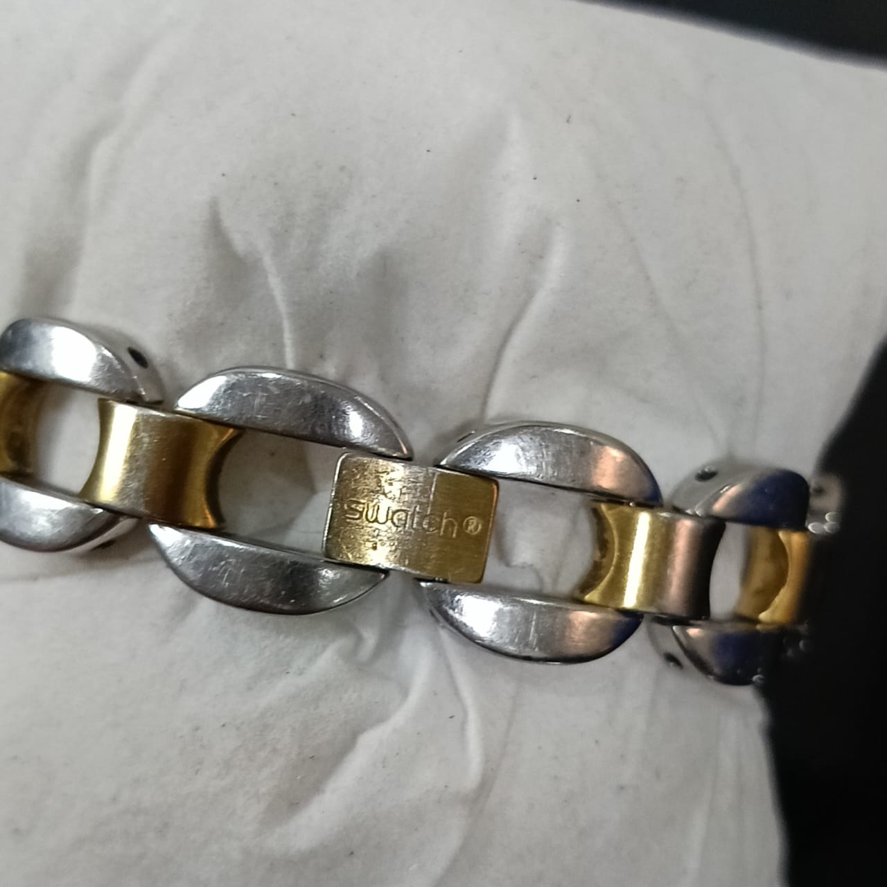 Montre swatch acier inoxydable femme original