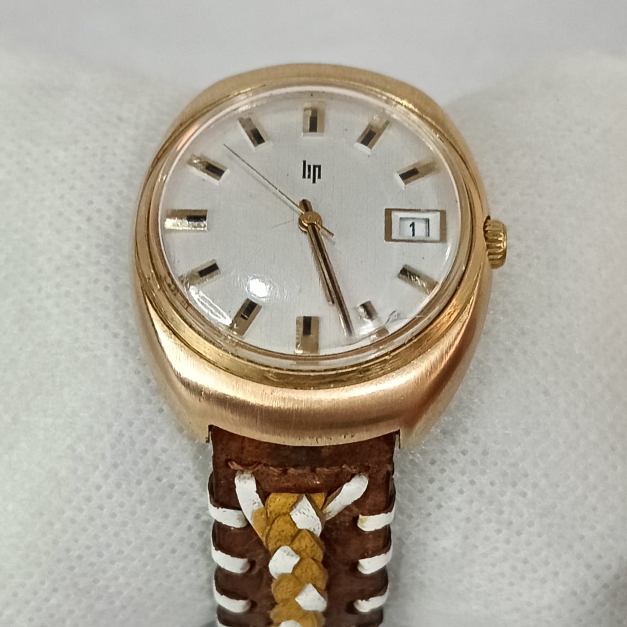 Montre lip elcto-mécanique en plaqué or