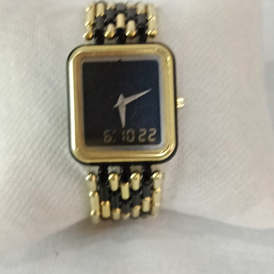Montre extra plat en plaqué or vintage Quartz