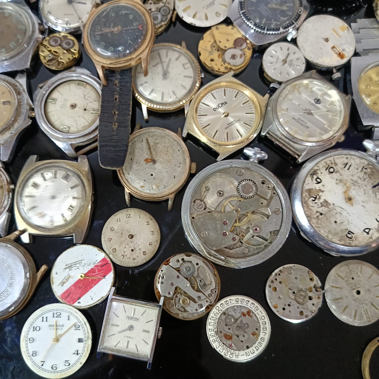 Lot casse montres mécaniques vintage