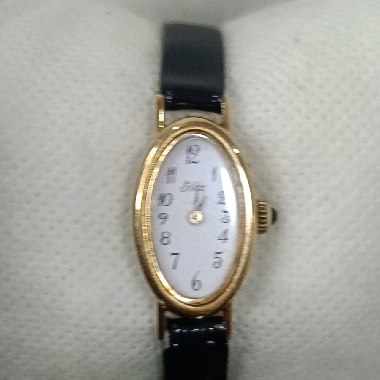 Montre mécanique vintage femme en plaqué or