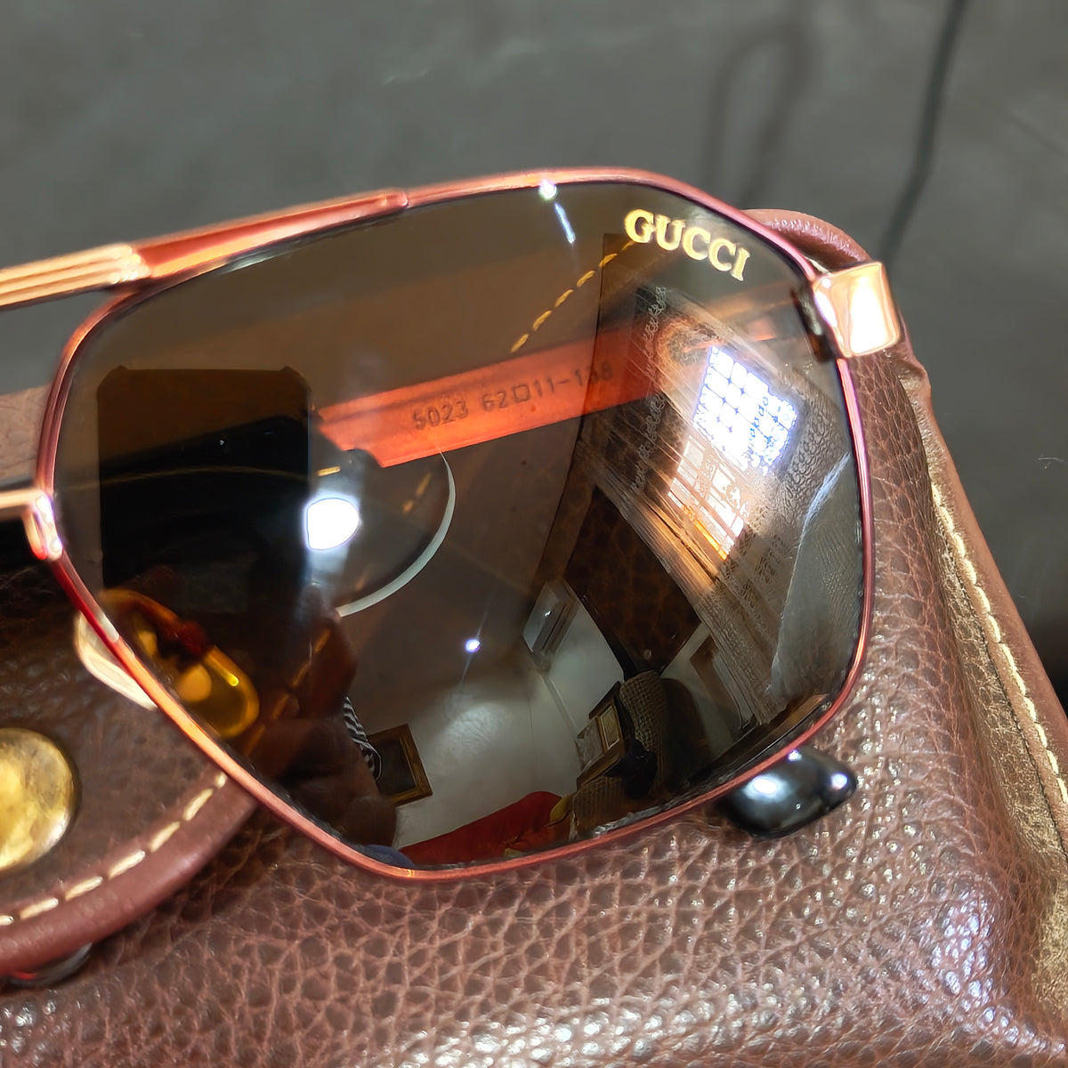 Lunette Gucci homme polarized original 
لون زجاج بني فاتح
62/11
سعر 18000