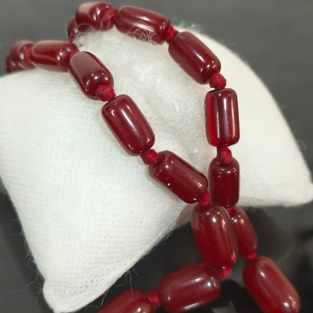 عقد تحفة بحجر كهرمان أحمر
طول مغلق 23cm
Prix 12000